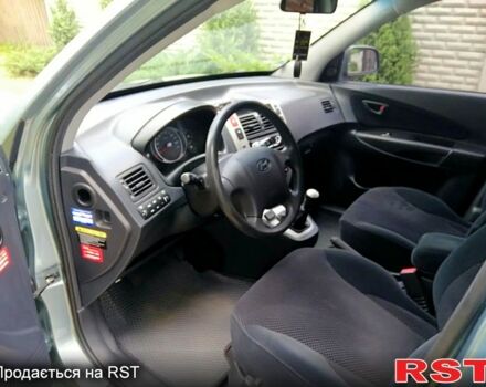 Серый Хендай Туксон, объемом двигателя 2 л и пробегом 179 тыс. км за 8500 $, фото 3 на Automoto.ua