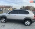 Серый Хендай Туксон, объемом двигателя 1.98 л и пробегом 215 тыс. км за 7500 $, фото 2 на Automoto.ua