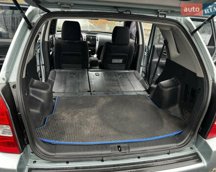 Серый Хендай Туксон, объемом двигателя 1.98 л и пробегом 253 тыс. км за 7650 $, фото 25 на Automoto.ua