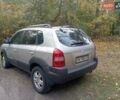 Серый Хендай Туксон, объемом двигателя 1.98 л и пробегом 312 тыс. км за 6000 $, фото 3 на Automoto.ua