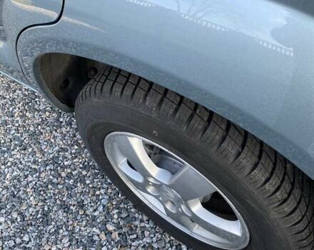 Серый Хендай Туксон, объемом двигателя 1.98 л и пробегом 220 тыс. км за 8500 $, фото 6 на Automoto.ua