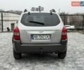 Серый Хендай Туксон, объемом двигателя 1.98 л и пробегом 252 тыс. км за 6950 $, фото 10 на Automoto.ua