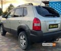 Сірий Хендай Туксон, об'ємом двигуна 2 л та пробігом 326 тис. км за 7750 $, фото 4 на Automoto.ua