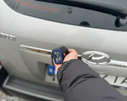 Серый Хендай Туксон, объемом двигателя 1.98 л и пробегом 241 тыс. км за 7000 $, фото 35 на Automoto.ua