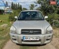 Серый Хендай Туксон, объемом двигателя 1.98 л и пробегом 210 тыс. км за 7100 $, фото 1 на Automoto.ua