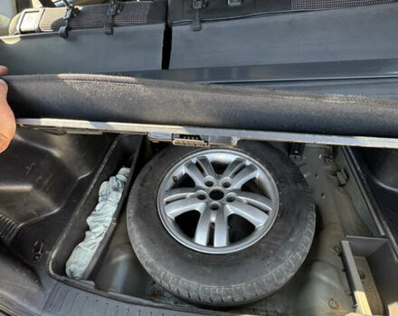 Серый Хендай Туксон, объемом двигателя 1.98 л и пробегом 207 тыс. км за 7050 $, фото 8 на Automoto.ua