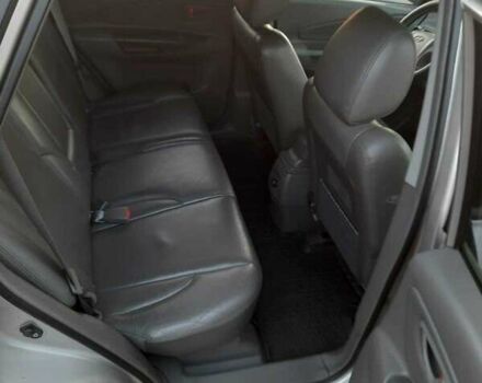 Серый Хендай Туксон, объемом двигателя 1.98 л и пробегом 164 тыс. км за 7300 $, фото 9 на Automoto.ua