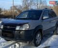 Серый Хендай Туксон, объемом двигателя 2.7 л и пробегом 294 тыс. км за 7500 $, фото 1 на Automoto.ua