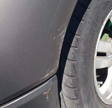 Серый Хендай Туксон, объемом двигателя 2 л и пробегом 258 тыс. км за 7500 $, фото 9 на Automoto.ua