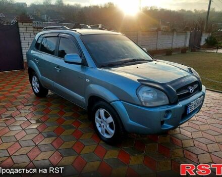 Серый Хендай Туксон, объемом двигателя 2 л и пробегом 175 тыс. км за 6250 $, фото 2 на Automoto.ua