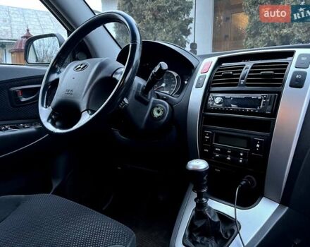 Серый Хендай Туксон, объемом двигателя 1.99 л и пробегом 156 тыс. км за 8200 $, фото 8 на Automoto.ua
