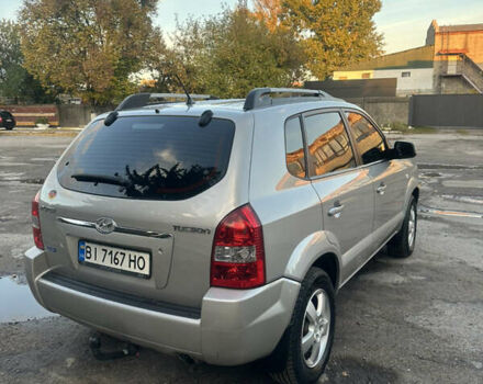 Серый Хендай Туксон, объемом двигателя 1.98 л и пробегом 220 тыс. км за 7800 $, фото 8 на Automoto.ua