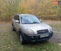 Серый Хендай Туксон, объемом двигателя 1.98 л и пробегом 312 тыс. км за 6000 $, фото 1 на Automoto.ua