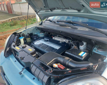 Сірий Хендай Туксон, об'ємом двигуна 1.98 л та пробігом 175 тис. км за 6250 $, фото 11 на Automoto.ua