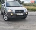 Серый Хендай Туксон, объемом двигателя 1.98 л и пробегом 260 тыс. км за 6800 $, фото 5 на Automoto.ua