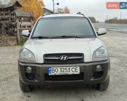 Серый Хендай Туксон, объемом двигателя 1.99 л и пробегом 210 тыс. км за 7900 $, фото 7 на Automoto.ua