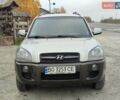 Серый Хендай Туксон, объемом двигателя 1.99 л и пробегом 210 тыс. км за 7900 $, фото 7 на Automoto.ua