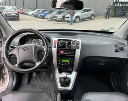 Сірий Хендай Туксон, об'ємом двигуна 2 л та пробігом 263 тис. км за 7440 $, фото 32 на Automoto.ua