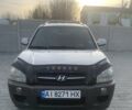 Серый Хендай Туксон, объемом двигателя 1.98 л и пробегом 215 тыс. км за 7500 $, фото 1 на Automoto.ua