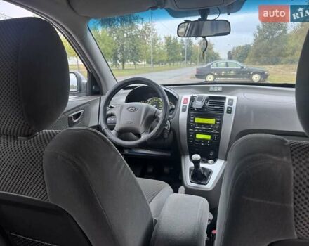Сірий Хендай Туксон, об'ємом двигуна 1.98 л та пробігом 255 тис. км за 7000 $, фото 11 на Automoto.ua