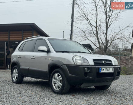 Серый Хендай Туксон, объемом двигателя 1.98 л и пробегом 241 тыс. км за 7000 $, фото 13 на Automoto.ua