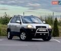Серый Хендай Туксон, объемом двигателя 2 л и пробегом 296 тыс. км за 7800 $, фото 1 на Automoto.ua