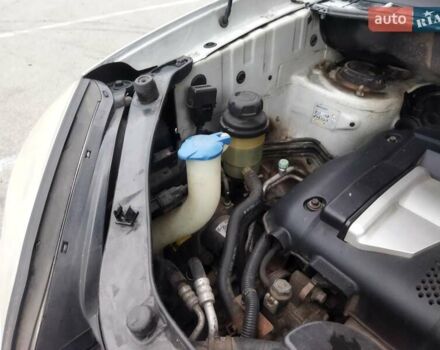 Серый Хендай Туксон, объемом двигателя 1.98 л и пробегом 278 тыс. км за 5300 $, фото 17 на Automoto.ua