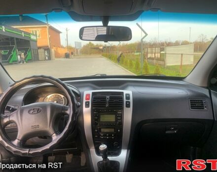 Серый Хендай Туксон, объемом двигателя 2 л и пробегом 215 тыс. км за 7500 $, фото 7 на Automoto.ua