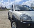 Сірий Хендай Туксон, об'ємом двигуна 2 л та пробігом 237 тис. км за 7499 $, фото 4 на Automoto.ua