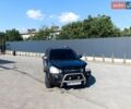 Серый Хендай Туксон, объемом двигателя 2 л и пробегом 295 тыс. км за 7500 $, фото 1 на Automoto.ua