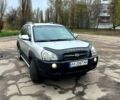 Серый Хендай Туксон, объемом двигателя 2 л и пробегом 220 тыс. км за 7700 $, фото 1 на Automoto.ua