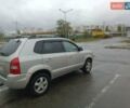 Серый Хендай Туксон, объемом двигателя 1.98 л и пробегом 250 тыс. км за 7300 $, фото 2 на Automoto.ua