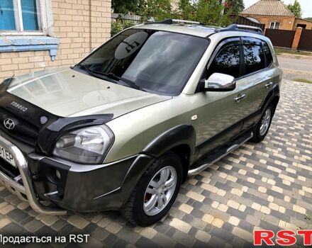 Сірий Хендай Туксон, об'ємом двигуна 2 л та пробігом 252 тис. км за 8300 $, фото 7 на Automoto.ua