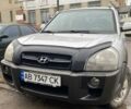 Серый Хендай Туксон, объемом двигателя 1.98 л и пробегом 252 тыс. км за 6199 $, фото 1 на Automoto.ua