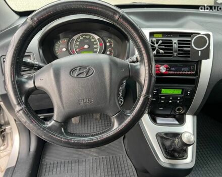 Сірий Хендай Туксон, об'ємом двигуна 2 л та пробігом 263 тис. км за 7440 $, фото 21 на Automoto.ua