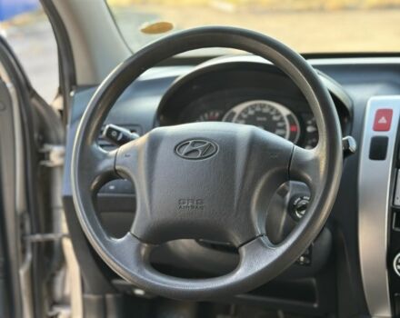 Серый Хендай Туксон, объемом двигателя 2 л и пробегом 188 тыс. км за 8800 $, фото 13 на Automoto.ua