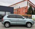 Сірий Хендай Туксон, об'ємом двигуна 2 л та пробігом 240 тис. км за 7500 $, фото 6 на Automoto.ua