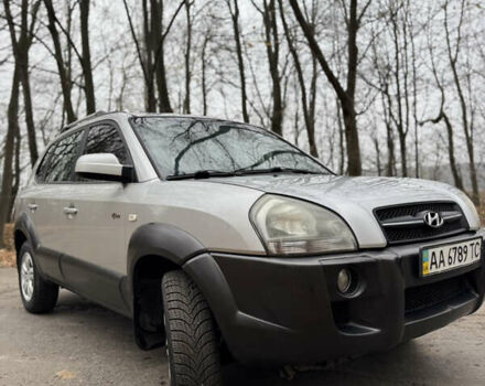 Серый Хендай Туксон, объемом двигателя 1.98 л и пробегом 269 тыс. км за 7100 $, фото 7 на Automoto.ua