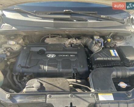 Серый Хендай Туксон, объемом двигателя 2 л и пробегом 161 тыс. км за 7000 $, фото 9 на Automoto.ua