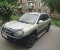 Серый Хендай Туксон, объемом двигателя 2 л и пробегом 178 тыс. км за 7300 $, фото 1 на Automoto.ua