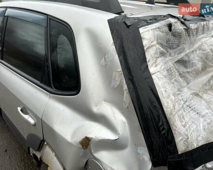 Серый Хендай Туксон, объемом двигателя 1.98 л и пробегом 340 тыс. км за 3999 $, фото 9 на Automoto.ua