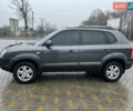 Серый Хендай Туксон, объемом двигателя 1.98 л и пробегом 242 тыс. км за 7499 $, фото 3 на Automoto.ua