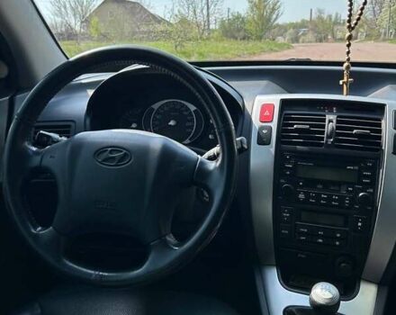 Сірий Хендай Туксон, об'ємом двигуна 1.98 л та пробігом 175 тис. км за 9000 $, фото 11 на Automoto.ua