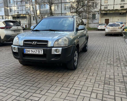 Серый Хендай Туксон, объемом двигателя 1.98 л и пробегом 269 тыс. км за 7500 $, фото 11 на Automoto.ua