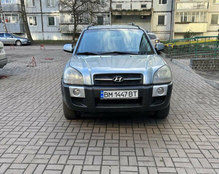 Серый Хендай Туксон, объемом двигателя 1.98 л и пробегом 269 тыс. км за 7500 $, фото 12 на Automoto.ua