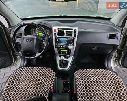 Серый Хендай Туксон, объемом двигателя 2 л и пробегом 231 тыс. км за 7999 $, фото 40 на Automoto.ua