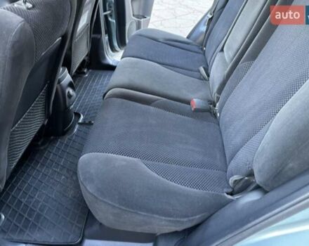 Серый Хендай Туксон, объемом двигателя 2 л и пробегом 110 тыс. км за 10200 $, фото 27 на Automoto.ua