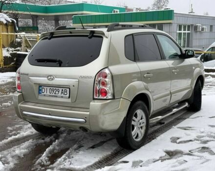Серый Хендай Туксон, объемом двигателя 2 л и пробегом 257 тыс. км за 6500 $, фото 2 на Automoto.ua