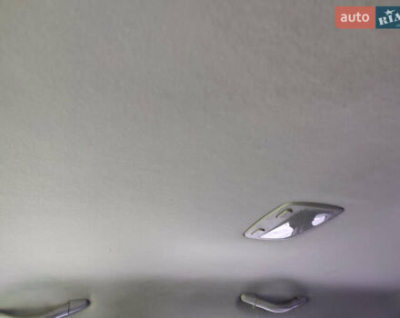 Серый Хендай Туксон, объемом двигателя 2 л и пробегом 217 тыс. км за 9800 $, фото 6 на Automoto.ua