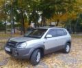 Серый Хендай Туксон, объемом двигателя 1.98 л и пробегом 250 тыс. км за 7300 $, фото 1 на Automoto.ua